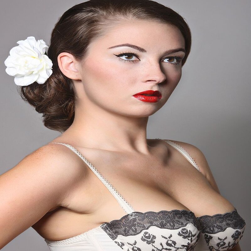 Woman with White Flower — Dramatic