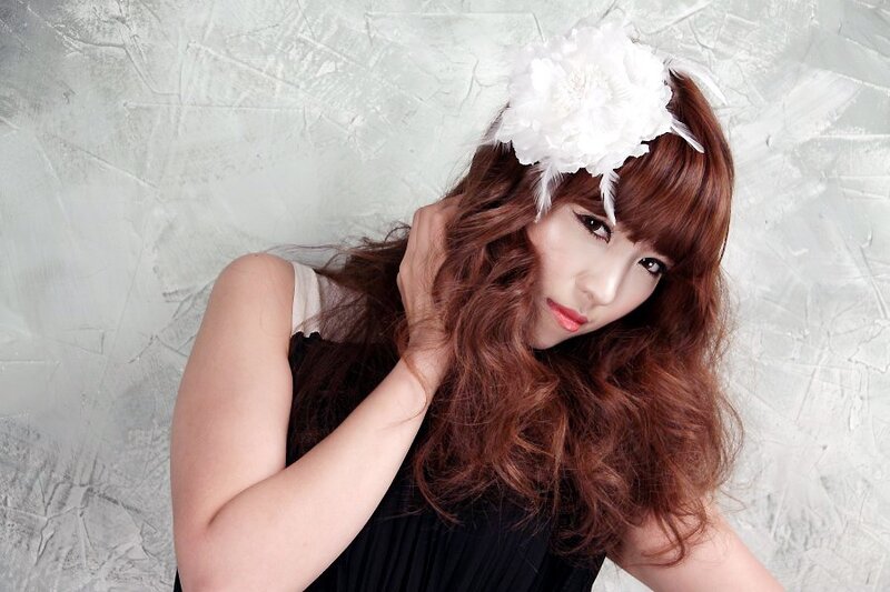 woman with white flower headpiece