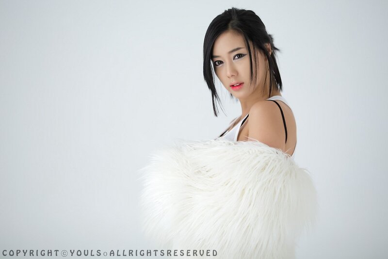 woman with white fur coat