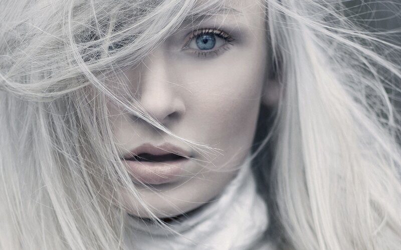 woman with white hair and blue eyes