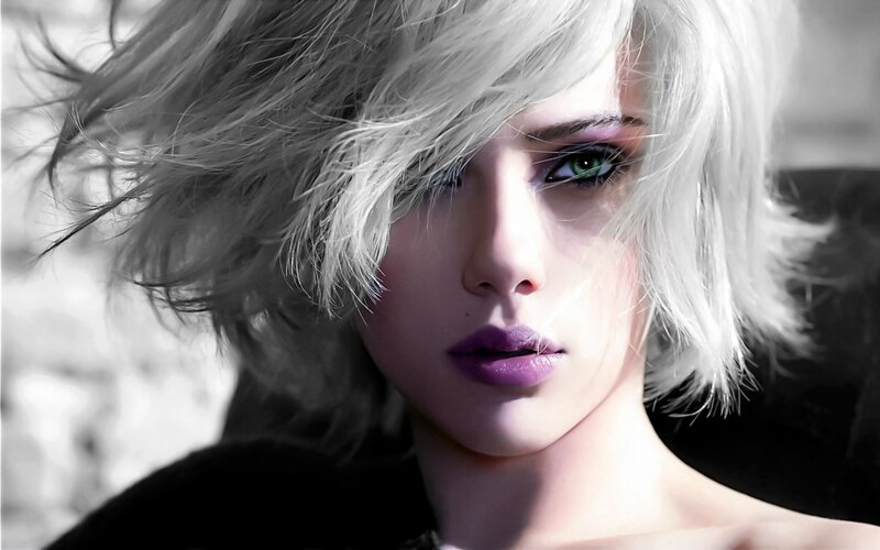 woman with white hair and green eyes
