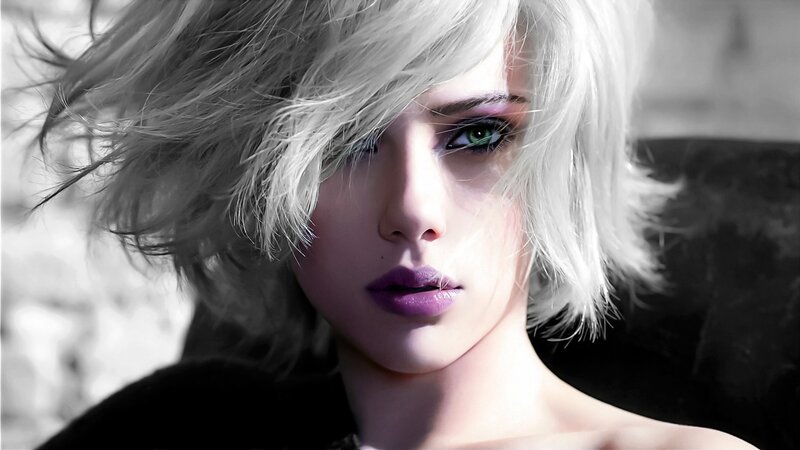 woman with white hair and green eyes