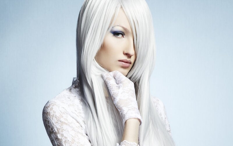 woman with white hair and lace