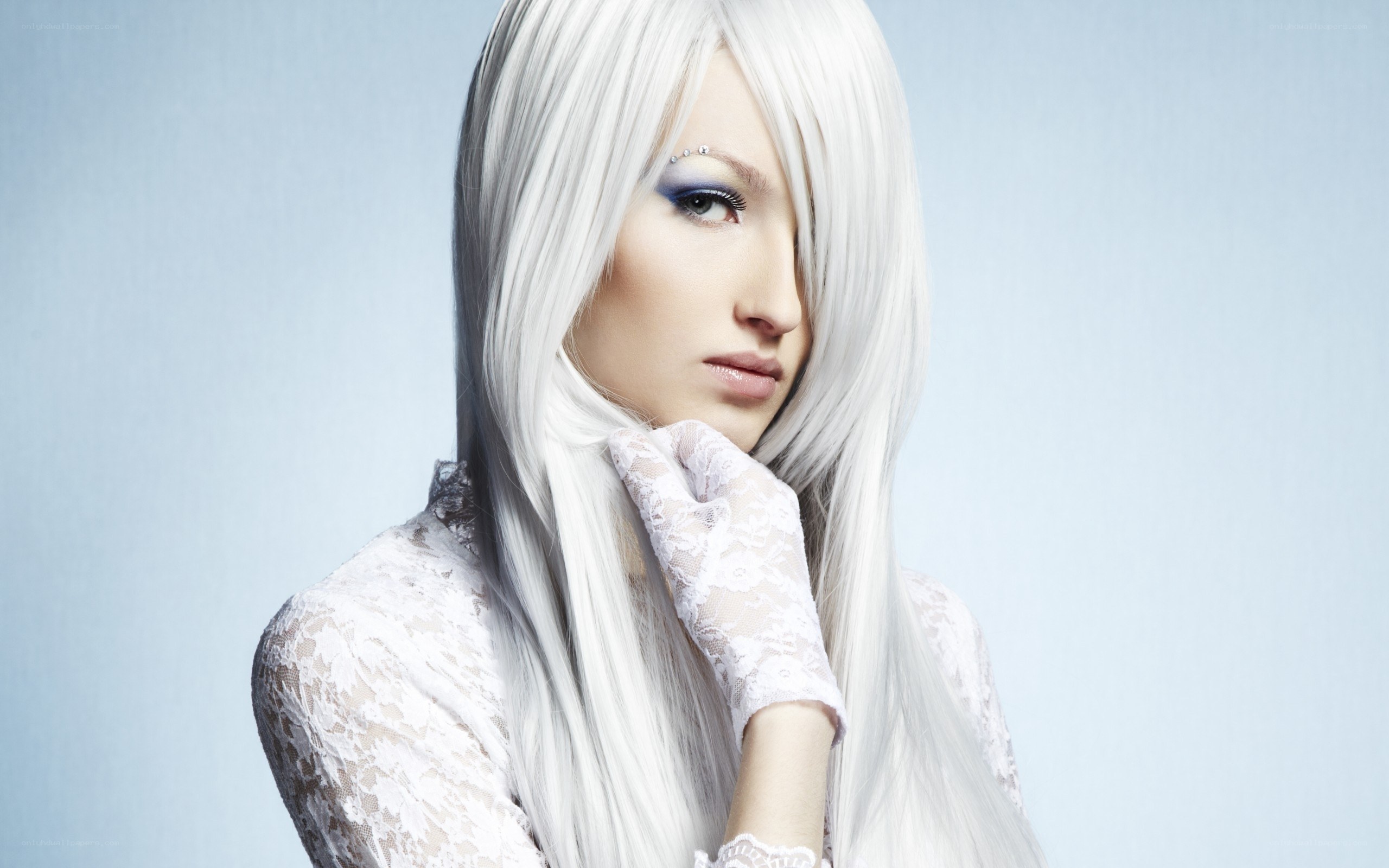 woman with white hair and lace