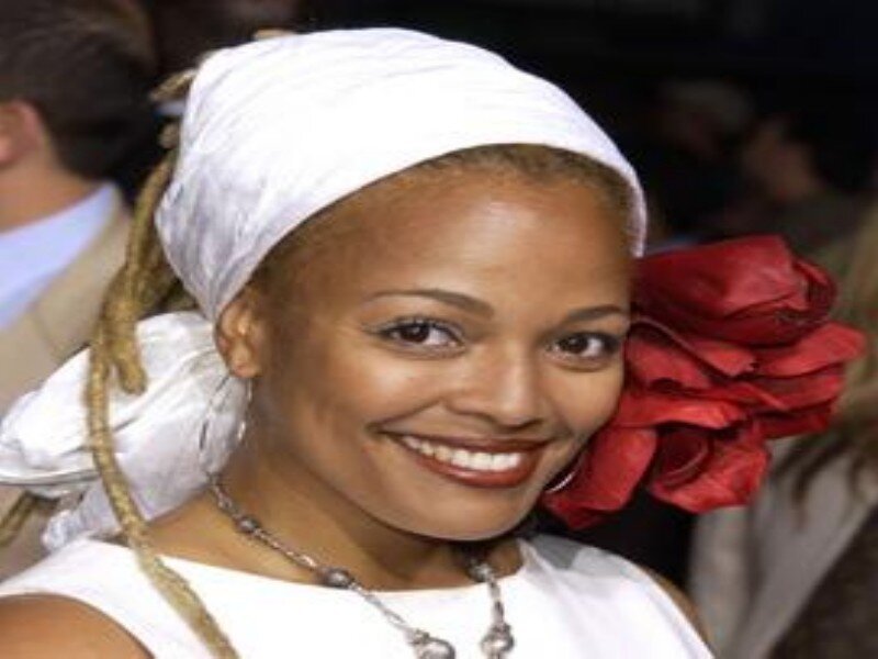 Woman with White Headwrap — Smiling