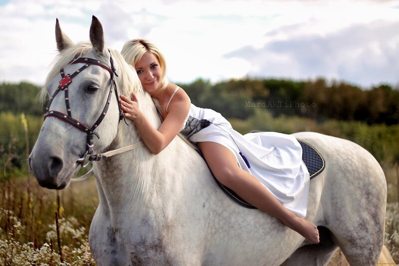 woman with white horse