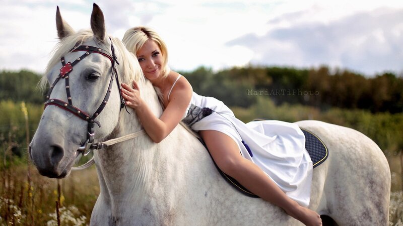 woman with white horse