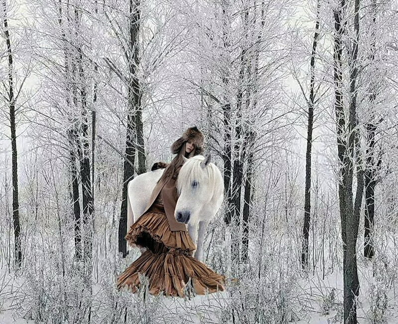 Woman with white horse in winter forest
