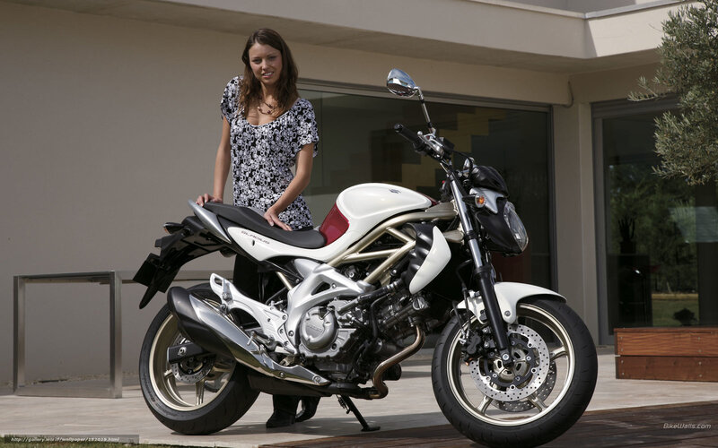 woman with white motorcycle