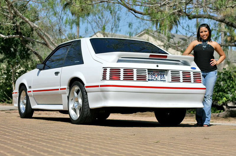 woman with white mustang