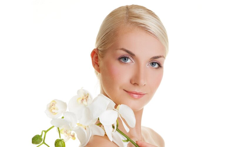 woman with white orchid