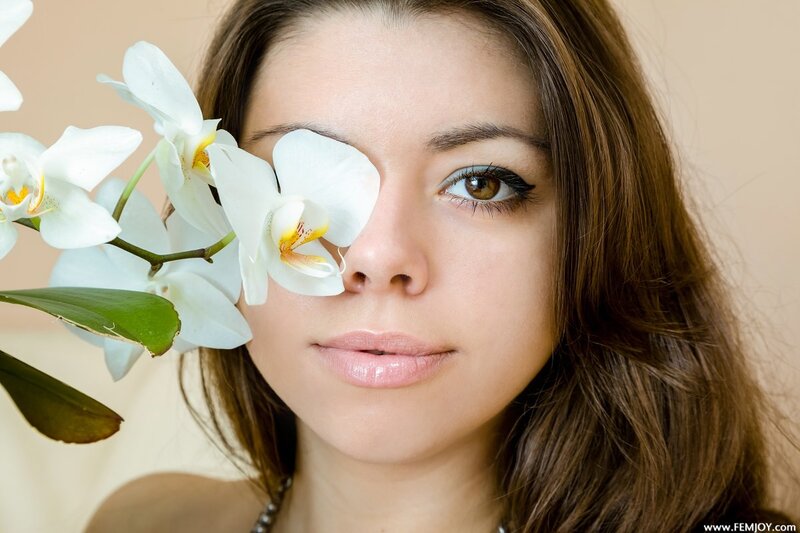 woman with white orchid