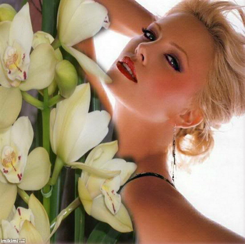 Woman with White Orchids — Dramatic, Photograph