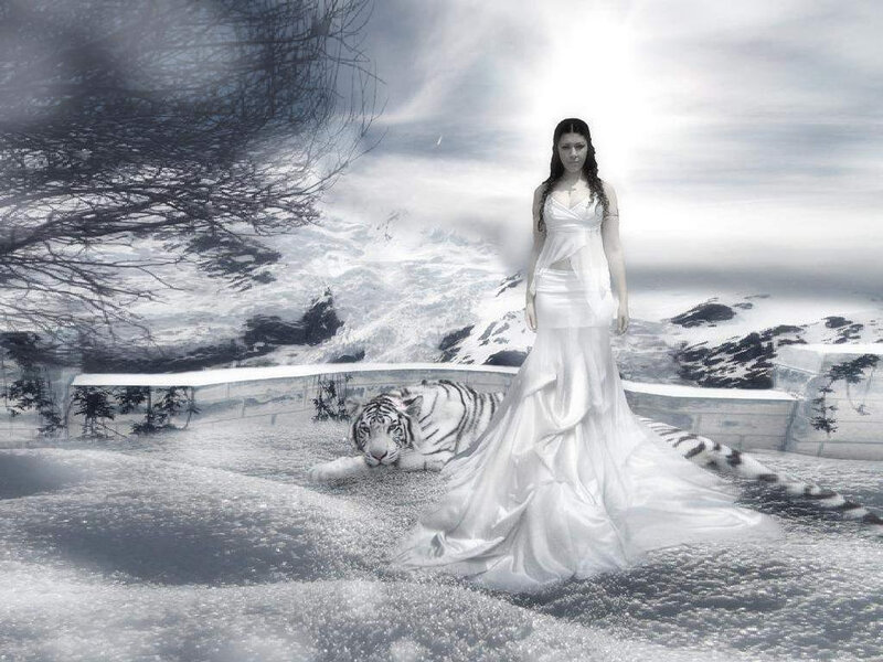 woman with white tiger in snow