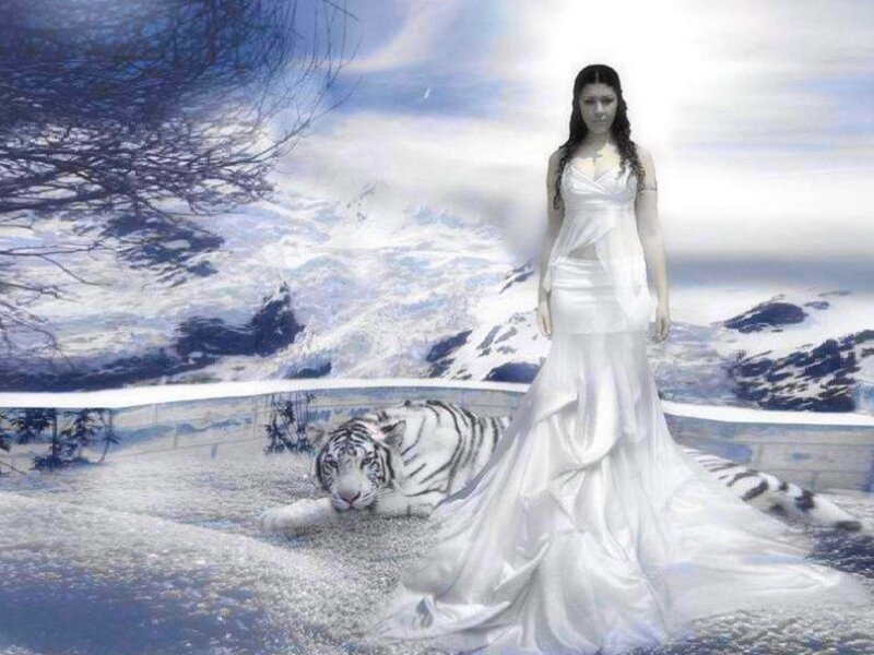 woman with white tiger in snow