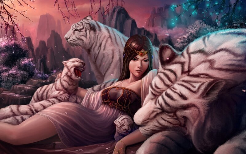 Woman with white tigers