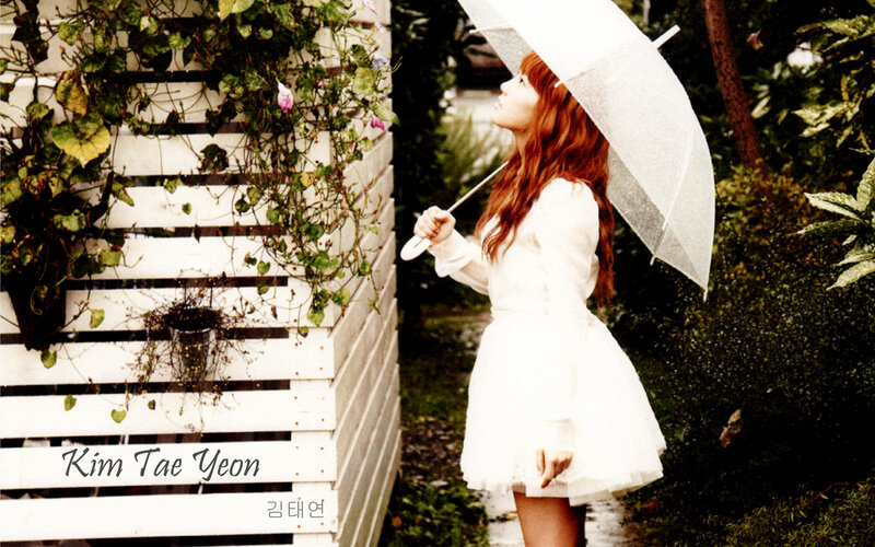 woman with white umbrella in garden