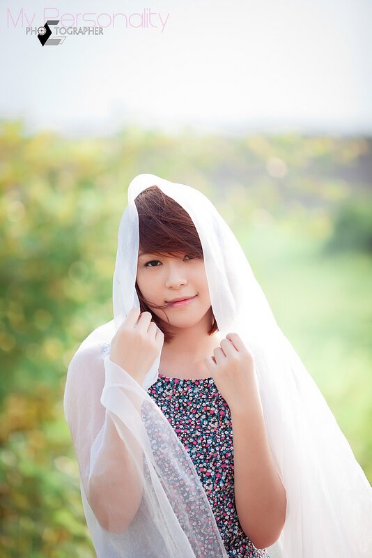 woman with white veil outdoors