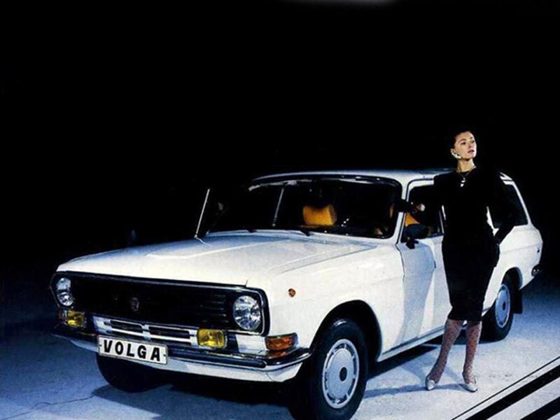 Woman with white Volga car