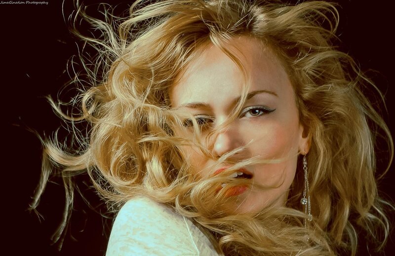 woman with wind-blown blonde hair