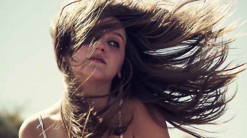 woman with wind-blown hair