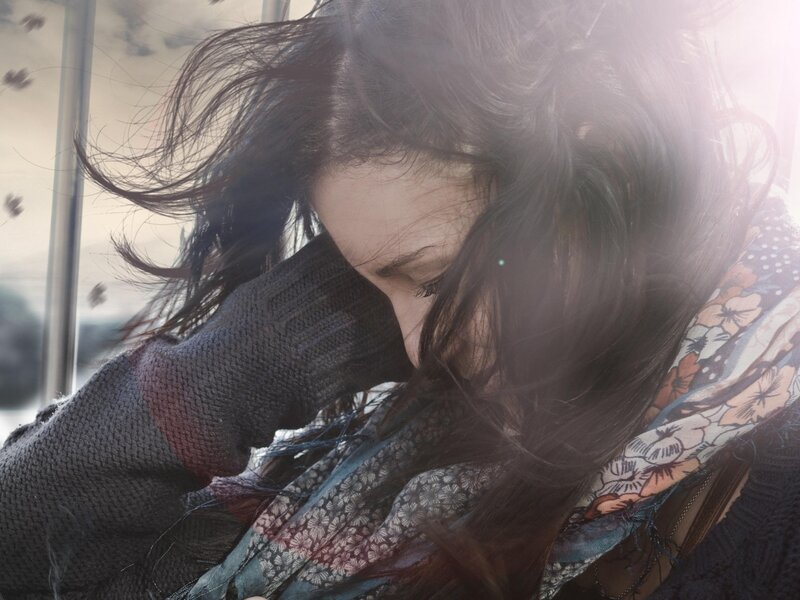 woman with wind-blown hair
