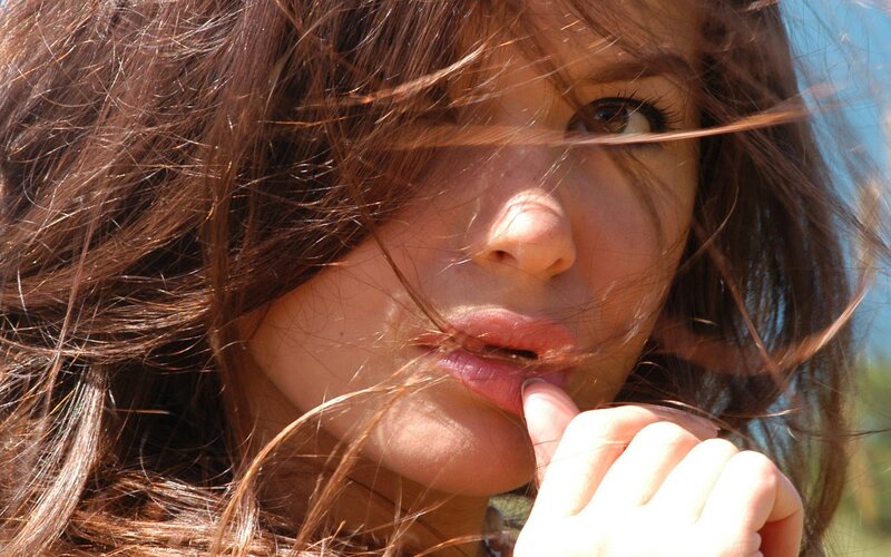 woman with wind-blown hair