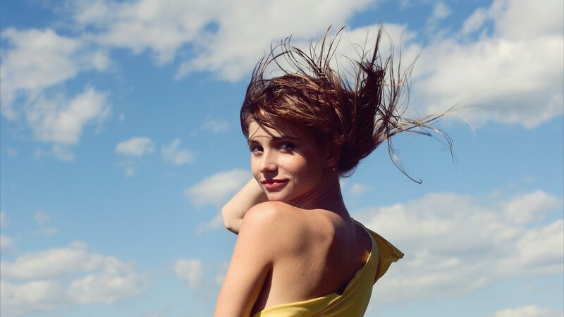 woman with wind-blown hair