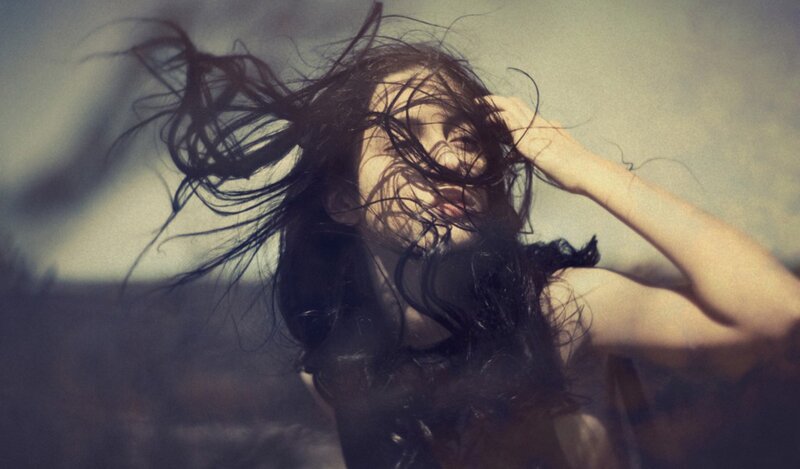 woman with wind-blown hair