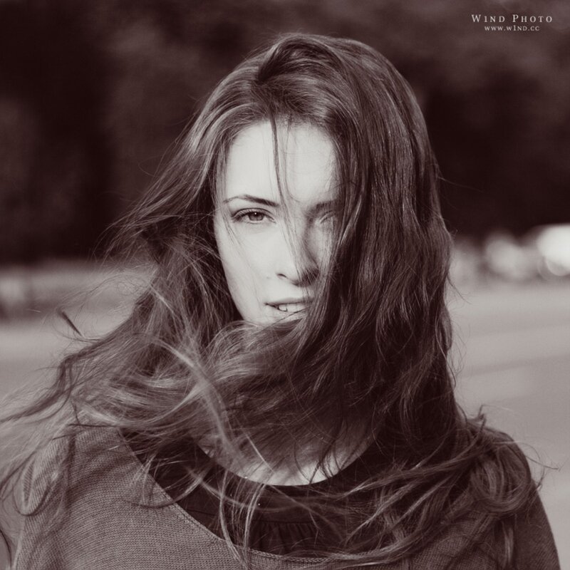 woman with wind-blown hair