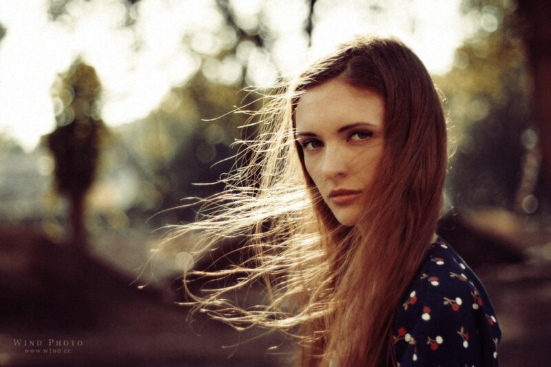 woman with wind-blown hair