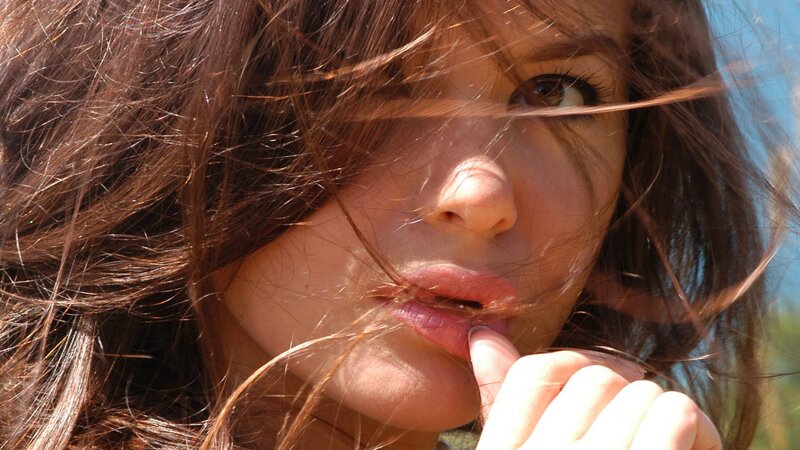 woman with wind-blown hair