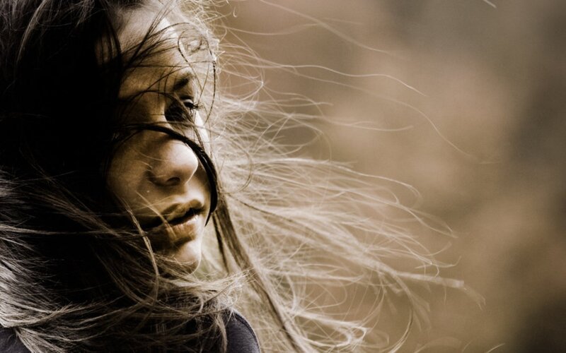 woman with wind-blown hair