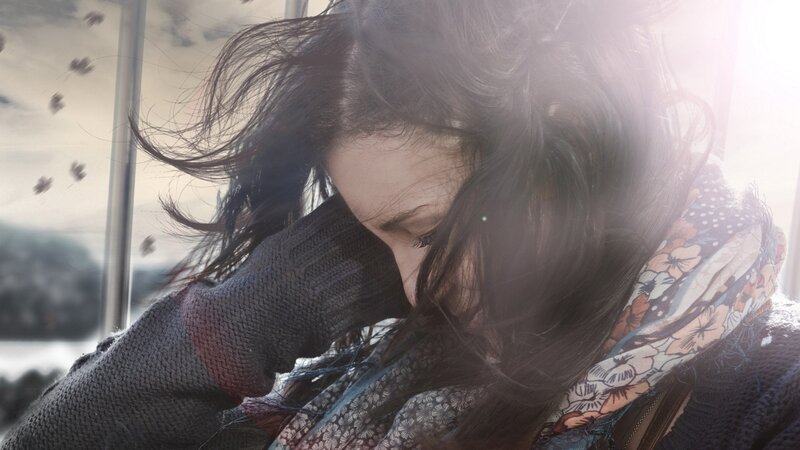 woman with wind-blown hair