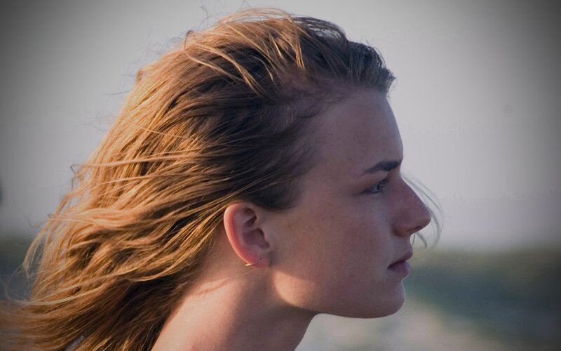 woman with wind-blown hair