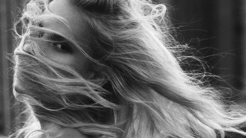 woman with wind-blown hair