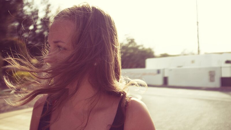 woman with wind-blown hair