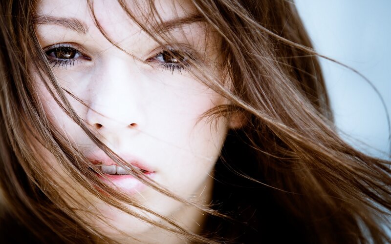 woman with wind-blown hair