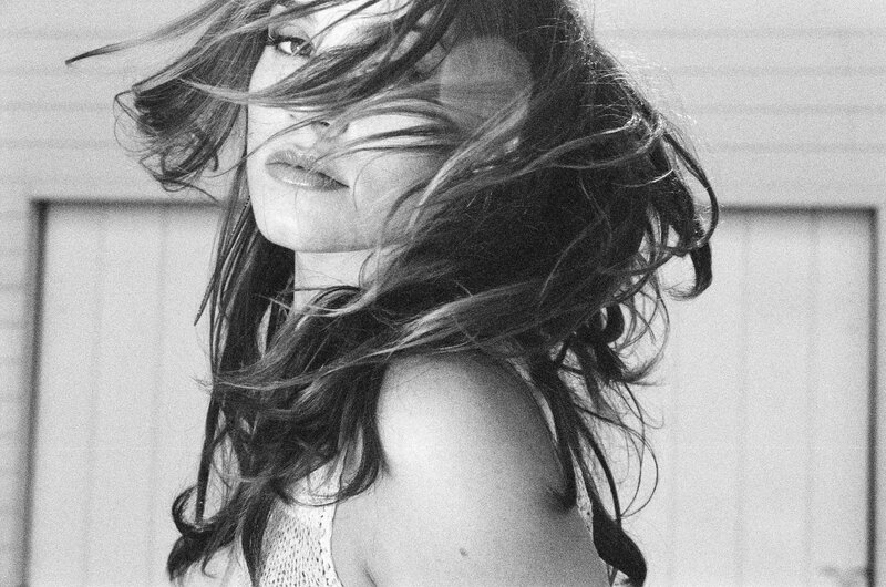 woman with wind-blown hair