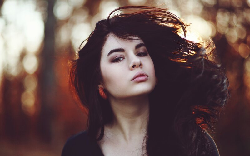 woman with wind-blown hair
