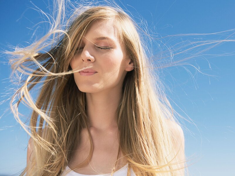woman with wind-blown hair