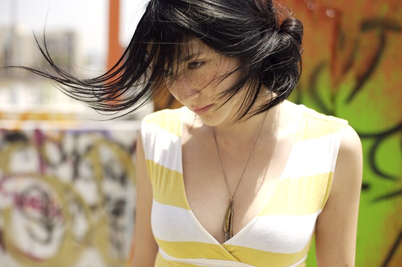 Woman with wind-blown hair