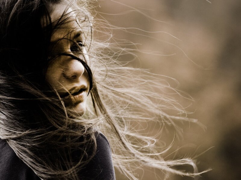 woman with wind-blown hair