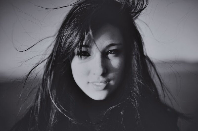 Woman with Wind-blown Hair — Black, Dramatic, Photograph, Face, White, Gray