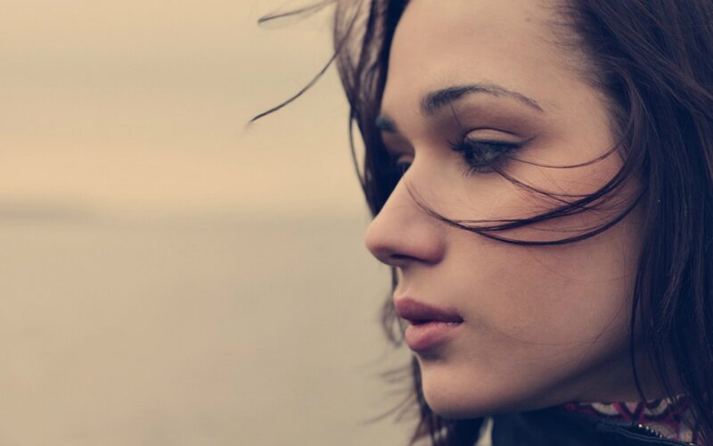 Woman with Wind-blown Hair — Brown, Contemplative