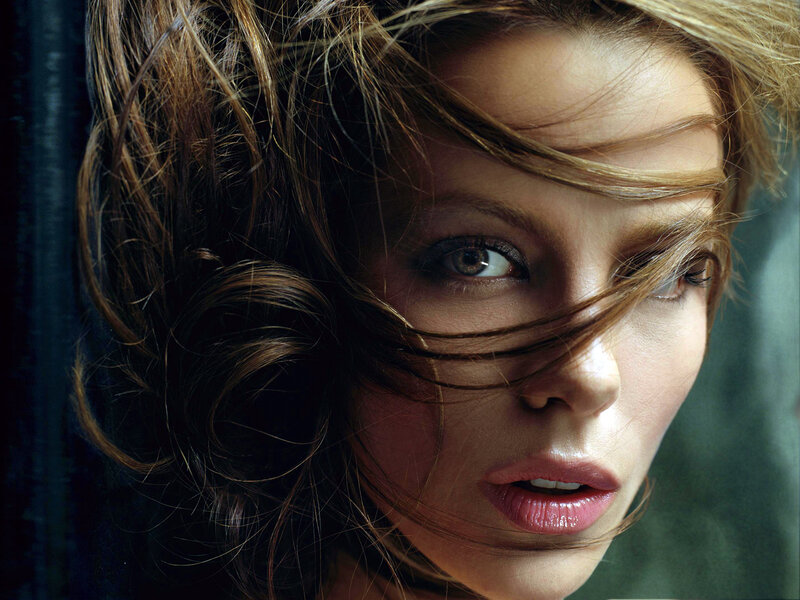 Woman with Wind-blown Hair — Brown, Dramatic, Photograph, Eyes