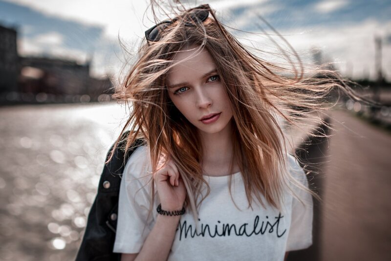 Woman with Wind-blown Hair — White, Dramatic, Afternoon
