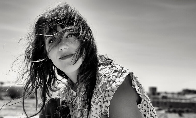 Woman with Windblown Hair — Black, Dramatic, Afternoon