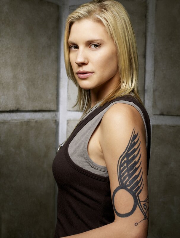 woman with wing tattoo