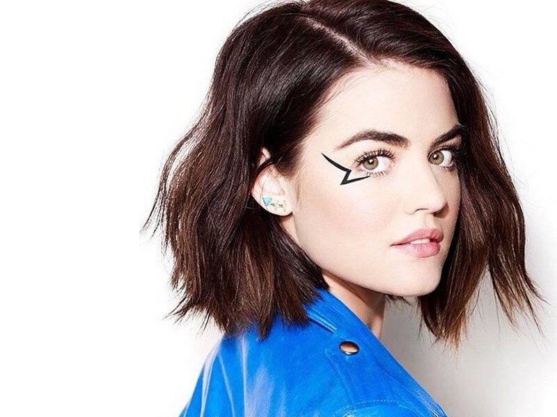 Woman with Winged Eyeliner — Blue